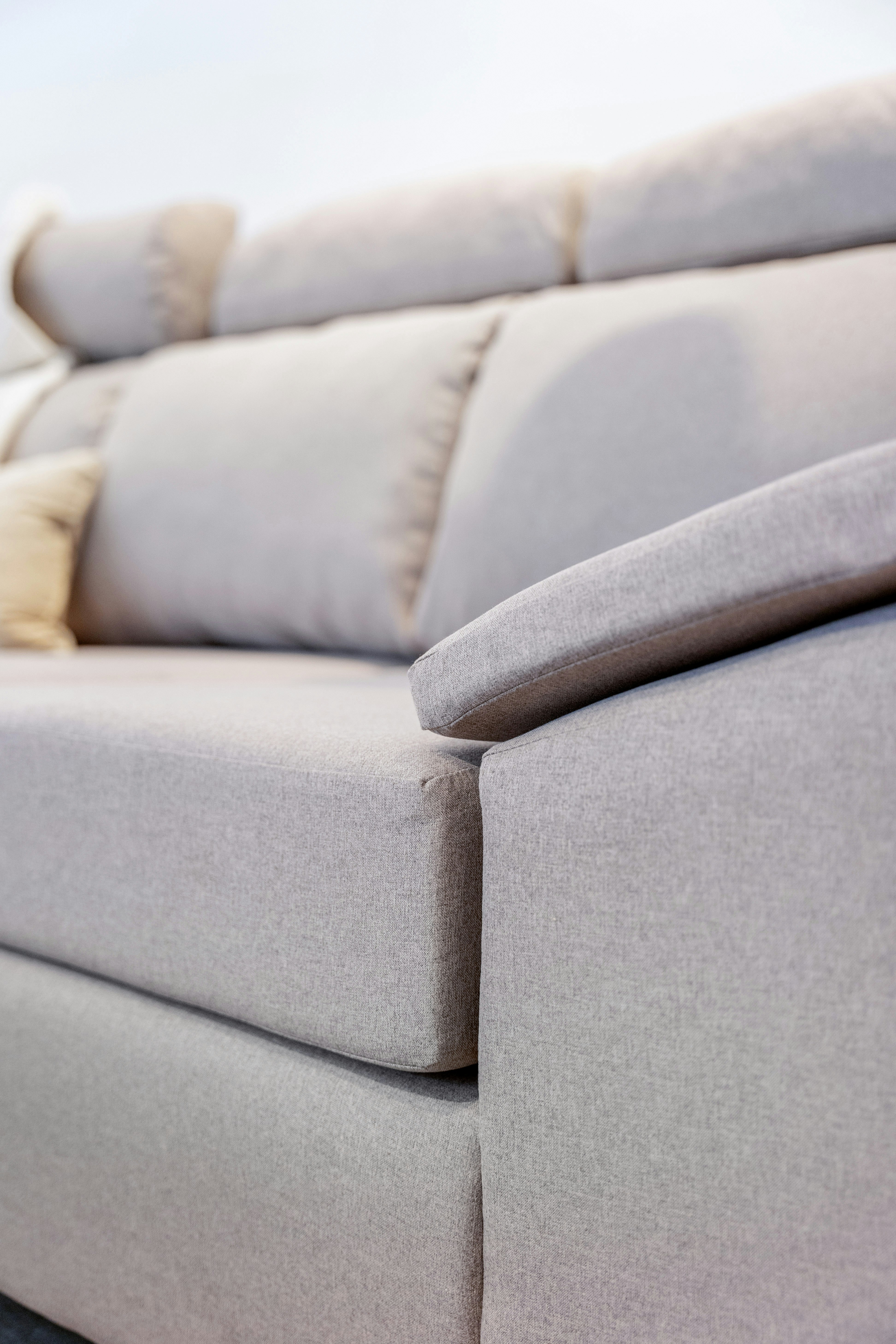 Light-colored sofa in a small living room creating an open feeling